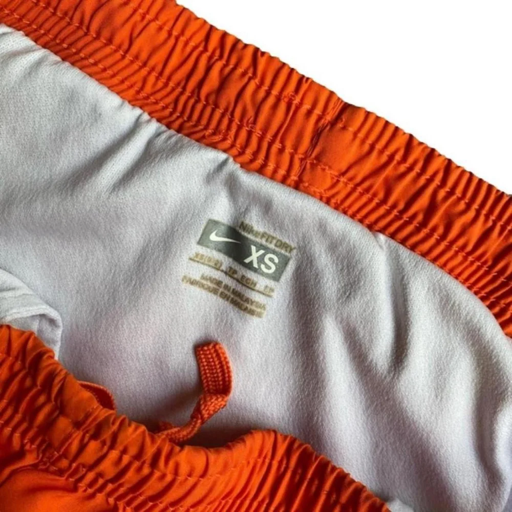 Nike XS Dry Fit Activewear Orange Shorts with White Lining - Picture 6 of 6